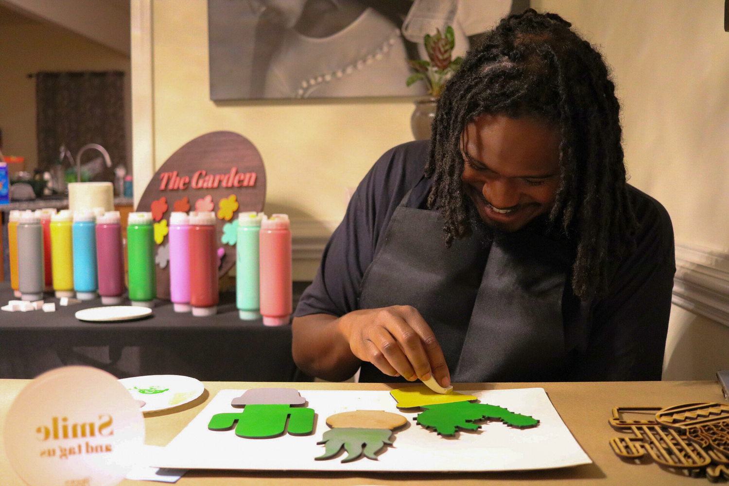 A man working on a paint party project by Brown Glitter 